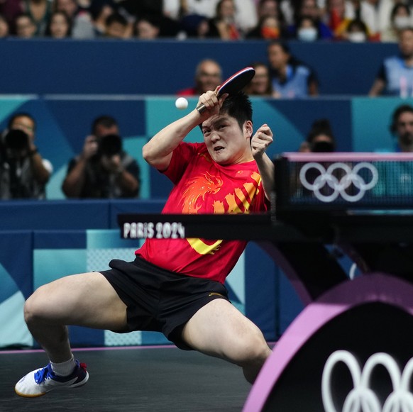 China&#039;s Fan Zhendong plays against France&#039;s Felix Lebrun during a men&#039;s singles semifinal table tennis match at the 2024 Summer Olympics, Friday, Aug. 2, 2024, in Paris, France. (AP Pho ...