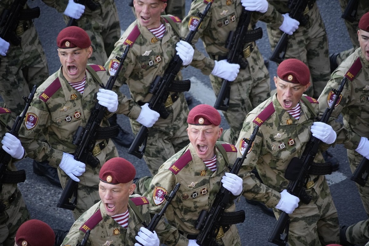 Russian soldiers march toward Red Square to attend a Victory Day military parade in Moscow, Russia, Tuesday, May 9, 2023, marking the 78th anniversary of the end of World War II. (AP Photo/Alexander Z ...
