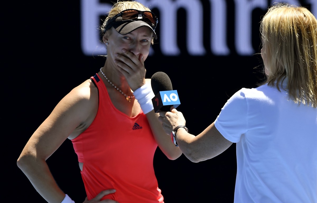 Croatia's Mirjana Lucic-Baroni cries as she is interviewed on the court following her win over Karolina Pliskova of the Czech Republic in their quarterfinal at the Australian Open tennis champion ...