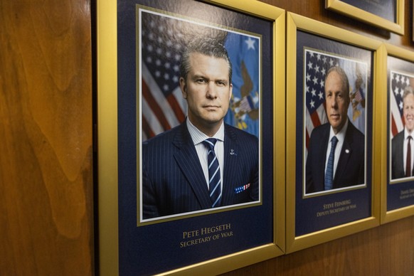 epa12365928 A portrait of Secretary of Defense Pete Hegseth titled Pete Hegseth Secretary of War hangs near the River Entrance at the Pentagon in Arlington, Virginia, USA, 09 September 2025. President ...