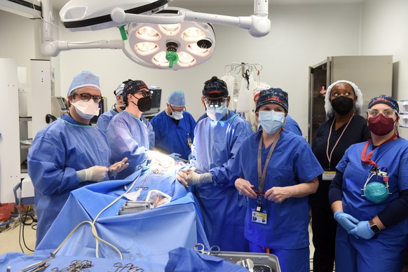 epa09677906 A handout photo made available by the University of Maryland School of Medicine (UMSOM) that shows Surgeon Bartley P. Griffith, MD leading a team that operated a successful transplant of a ...