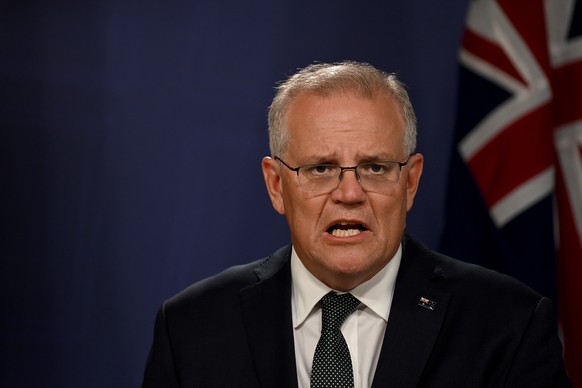 epa09780181 Australian Prime Minister Scott Morrison speaks to the media during a press conference following the beginning of the Russian military operation in Ukraine, in Sydney, Australia, 24 Februa ...