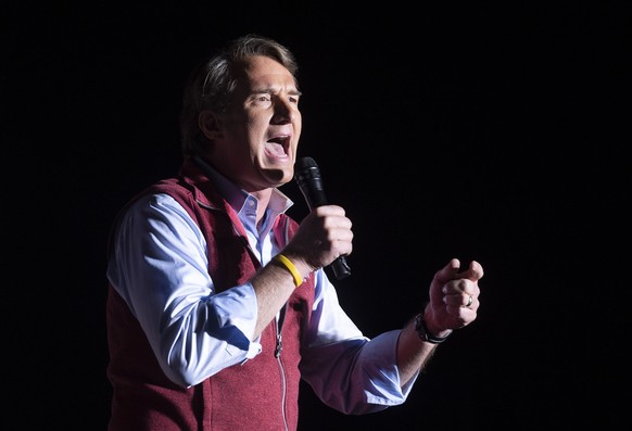 Republican gubernatorial candidate Glenn Youngkin addresses supporters at a campaign rally in Leesburg, Va., Monday, Nov. 1, 2021. (AP Photo/Cliff Owen)