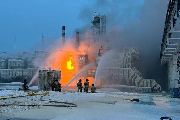 In this photo released by Telegram Channel of Leningrad Region Governor Alexander Drozdenko fire fighters extinguish the blaze at Russia's second-largest natural gas producer, Novatek in Ust-Luga ...