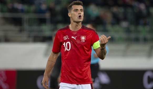 Switzerland's midfielder Granit Xhaka gestures, during an international friendly test match between the the national soccer teams of Switzerland and Croatia, at the kybunpark stadium in St. Gallen, Sw ...