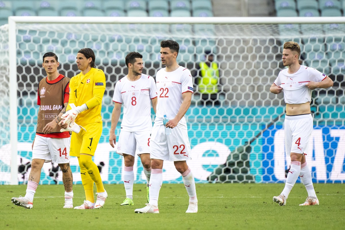 Switzerland's soccer players reacts during the Euro 2020 soccer tournament group A match between Wales and Switzerland at the Olympic stadium, in Baku, Azerbaijan, Saturday, June 12, 2021. (KEYST ...