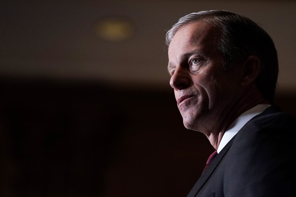 epa08871432 Sen. John Thune (R-S.D.) speaks during a news conference with other Republican leaders at the U.S. Capitol Building in Washington, DC, USA, 08 December 2020. McConnell spoke on the ongoing ...