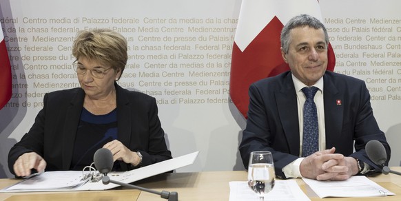 Swiss Federal Councillor Ignazio Cassis, right, and Swiss Federal Councillor Viola Amherd take part in a media conference on the peace conference in Bern, Switzerland,Monday, June 10, 2024. Switzerlan ...