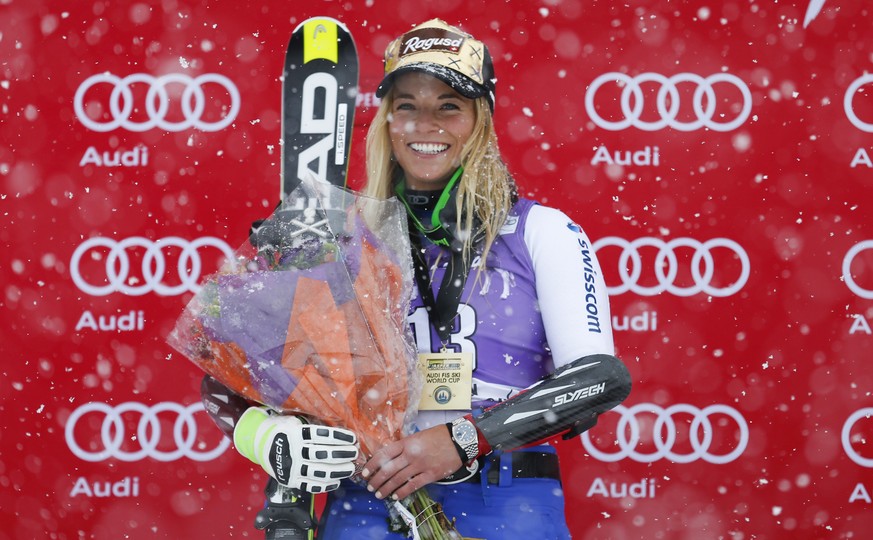Nov 27, 2015; Aspen, CO, USA; Lara Gut of Switzerland poses at the top of the podium during the women's giant slalom race at the FIS alpine skiing World Cup at Aspen Snowmass. Mandatory Credit: J ...