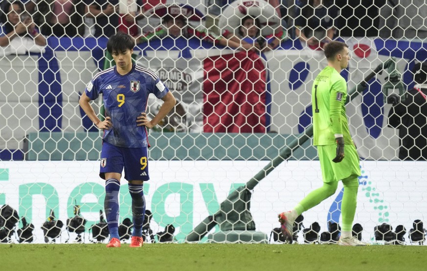 221205 -- AL WAKRAH, Dec. 5, 2022 -- Mitoma Kaoru L of Japan reacts after missing the penalty shot during the penalty shootout of the Round of 16 match between Japan and Croatia at the 2022 FIFA World ...