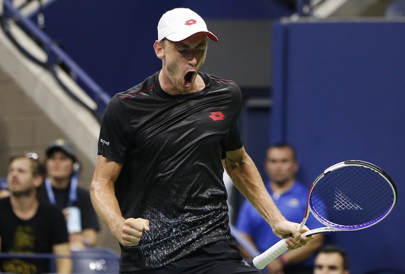 John Millman, of Australia, reacts after winning a point against Roger Federer, of Switzerland, during the fourth round of the U.S. Open tennis tournament, Monday, Sept. 3, 2018, in New York. (AP Phot ...