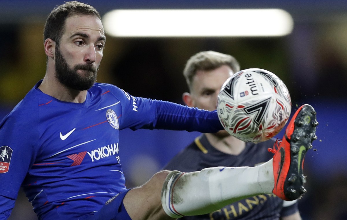 Chelsea's Gonzalo Higuain kicks the ball during the English FA Cup fourth round soccer match between Chelsea and Sheffield Wednesday at Stamford Bridge stadium in London, Sunday, Jan. 27, 2019. ( ...