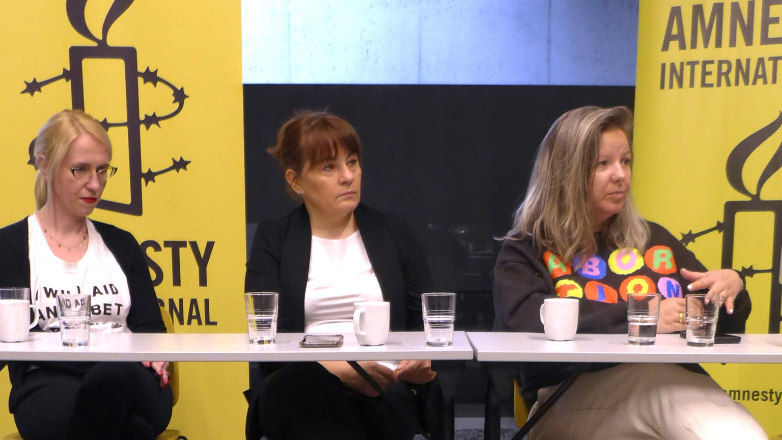 From left, members of the organization Abortion Dream Team Kinga Jelinska, Justyna Wydrzynska and Natalia Broniarczyk speak during a media conference in Brussels, Thursday, March 23, 2023. Justyna Wyd ...
