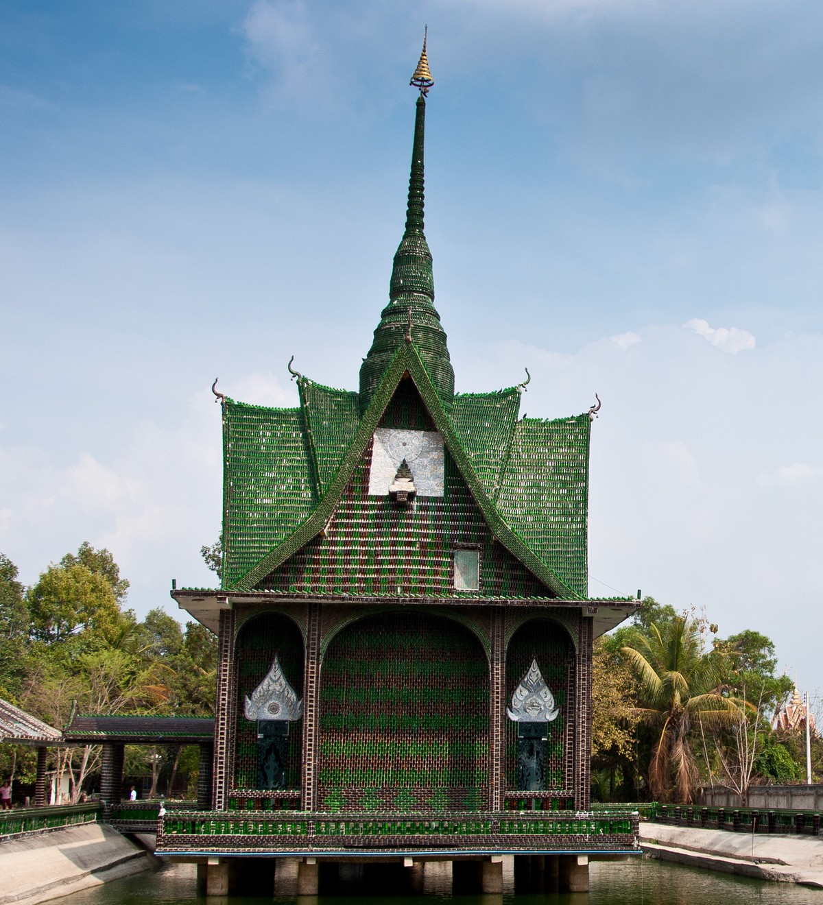 The main building at Wat Pa Maha Chedio Kaew, more commonly know as "The Million Bottle Temple" or "Wat Lan Kuad" in Thai. This Buddhist temple about 300 miles from Bangkok is deco ...