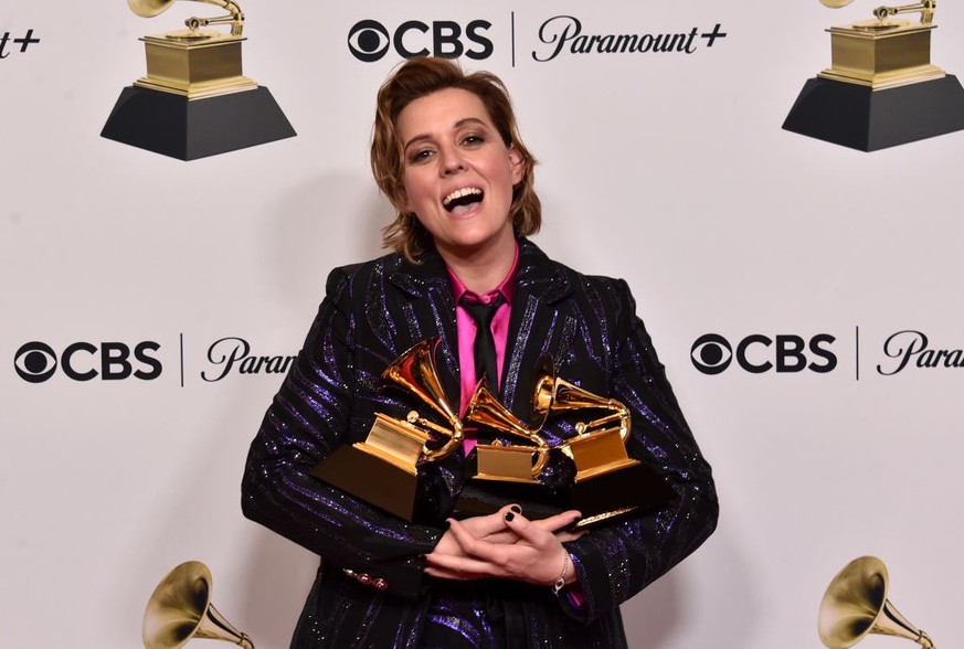 LOS ANGELES, CALIFORNIA - FEBRUARY 05: Brandi Carlile poses with the Best Americana Album Award for “In These Silent Days,” Best Rock Song Award for ”Broken Horses,” and Best Rock Performance Award fo ...