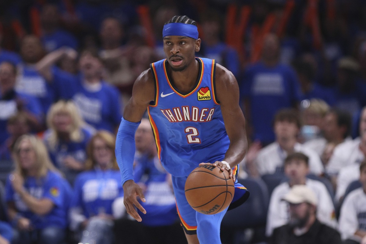 Oklahoma City Thunder guard Shai Gilgeous-Alexander (2) dribbles down the court during the second half of Game 5 of the Western Conference finals of the NBA basketball playoffs against the Minnesota T ...