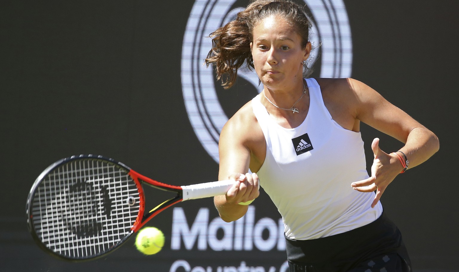 Daria Kasatkina of Russia returns during her quarterfinal tennis match against Maria Sakkari of Greece at the WTA Tour tournament in Berlin, Germany, Friday, June 17, 2022. (Wolfgang Kumm/dpa via AP)