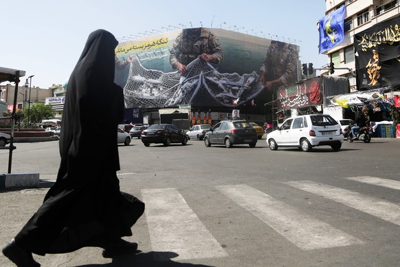 A giant banner hung in Tehran with the message: The Strait of Hormuz will remain closed the entire Persian Gulf is our hunting ground. TEHRAN, IRAN - APRIL 05: A general view of the giant banner hung  ...
