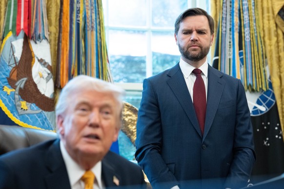 epa12826170 US President Donald Trump (L) gives remarks as Vice President JD Vance looks on during an Executive Order signing event in the Oval Office of the White House in Washington, DC, USA, 16 Mar ...
