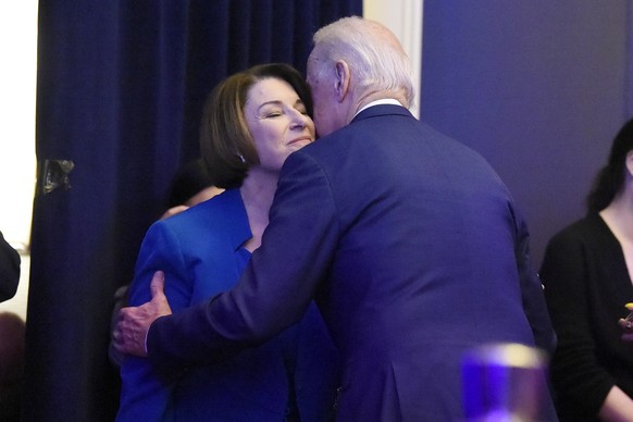 FILE - In this Feb. 24, 2020 photo, file photo Democratic presidential candidates Joe Biden and U.S, Sen. Amy Klobuchar, D-Minn. greet at a South Carolina Democratic Party dinner in Charleston, S.C. ( ...