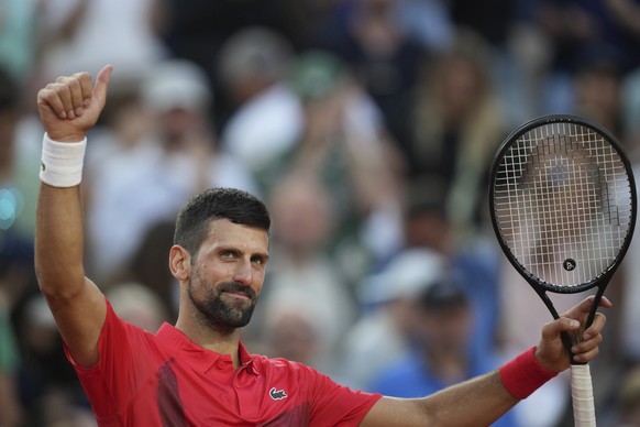 Serbia&#039;s Novak Djokovic celebrates beating France&#039;s Corentin Moutet after their second round match of the French Tennis Open, at the Roland-Garros stadium, in Paris, Thursday, May 29, 2025.  ...