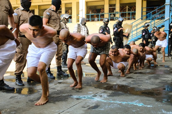 epaselect epa09857001 A handout photo made available by the Government of El Salvador shows Mara Salvatrucha and Barrio 18 gang members during a search at the Quezaltepeque Penal Center, El Salvador 2 ...