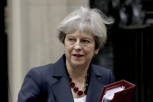 British Prime Minister Theresa May leaves 10 Downing Street in London, to attend Prime Minister&#039;s Questions at the Houses of Parliament, Wednesday, June 28, 2017. (AP Photo/Matt Dunham)