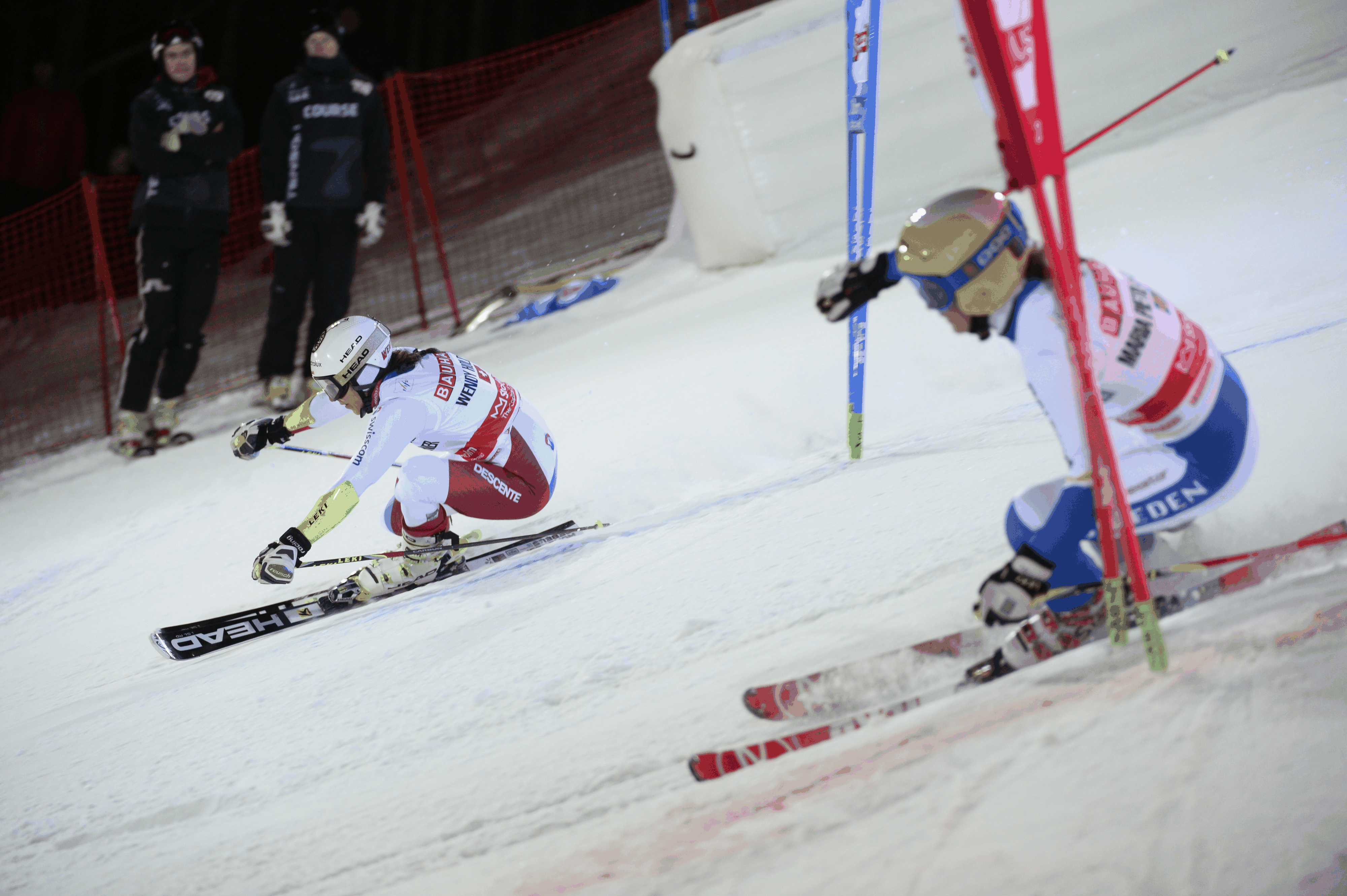 Wendy Holdener of Switzerland, left, competes against Maria Pietila Holmner of Sweden during the women&#039;s Parallel Slalom City Event of the FIS Alpine Skiing World Cup on Tuesday, Feb. 23, 2016. ( ...