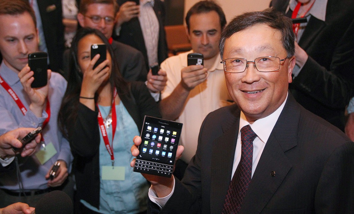 BlackBerry CEO John Chen shows off the new Passport phone after the company's annual general meeting in Waterloo, Ontario, Thursday June 19, 2014. (AP Photo/The Canadian Press, Dave Chidley)