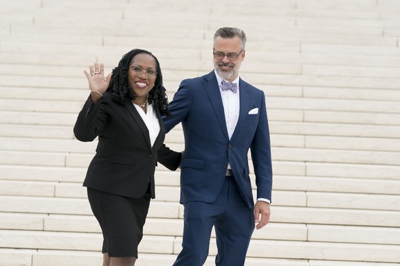Justice Ketanji Brown Jackson, left, is joined by her husband, Dr. Patrick Jackson, following her formal investiture ceremony at the Supreme Court in Washington, Friday, Sept. 30, 2022. (AP Photo/J. S ...