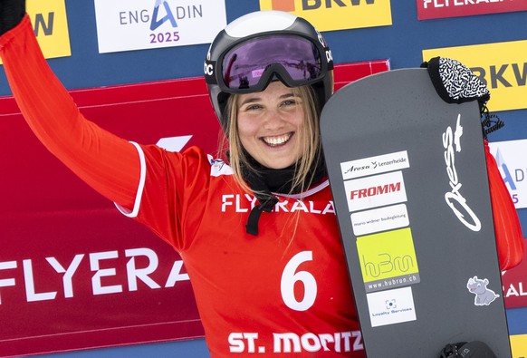 Sophie Hediger of Switzerland reacts after the Snowboard Cross World Cup race in St. Moritz, Switzerland, on Friday, January 26, 2024. (KEYSTONE/Mayk Wendt)