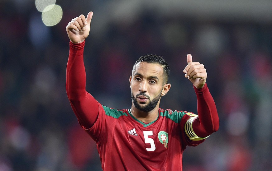 epa06625321 Marocco&#039;s Medhi Benatia celebrates the victory at the end of the friendly soccer match Marocco vs Serbia at Olimpico stadium in Turin, Italy, 23 March 2018. EPA/ALESSANDRO DI MARCO