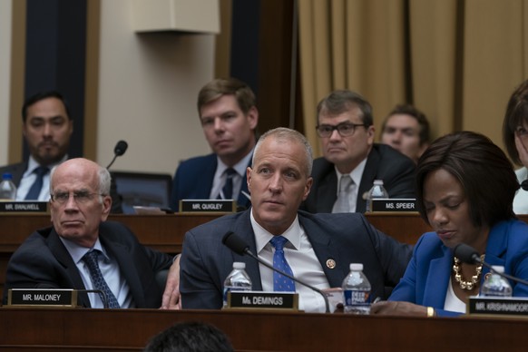 House Intelligence Committee Democrats listen as former special counsel Robert Mueller testifies about his investigation into Russian interference in the 2016 election, on Capitol Hill in Washington,  ...