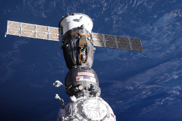 FILE - This handout photo taken by Russian cosmonaut Sergei Korsakov and released by Roscosmos State Space Corporation on Wednesday, Jan. 11, 2023, shows a Soyuz capsule of the International Space Sta ...