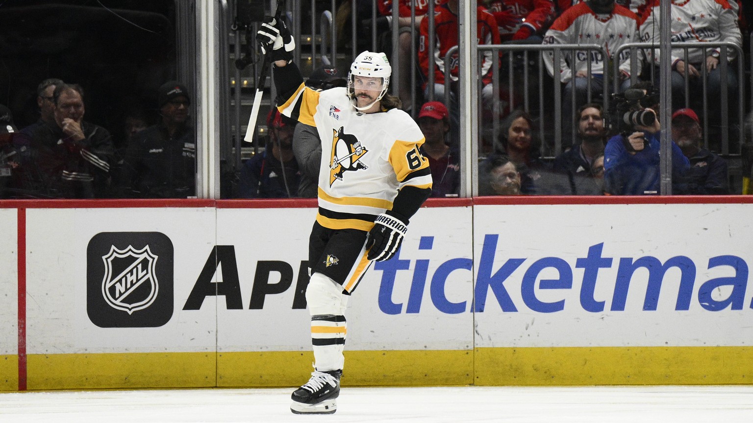 Pittsburgh Penguins defenseman Erik Karlsson (65) celebrates his goal during the first period of an NHL hockey game against the Washington Capitals, Friday, Nov. 8, 2024, in Washington. (AP Photo/Nick ...
