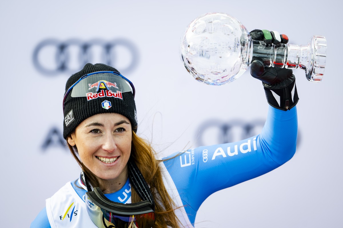 Sofia Goggia of Italy poses winner of the women's Super-G overall leader crystal globe trophy celebrates during the podium ceremony at the Lillehammer FIS Alpine Ski World Cup Finals, in Kvitfjel ...