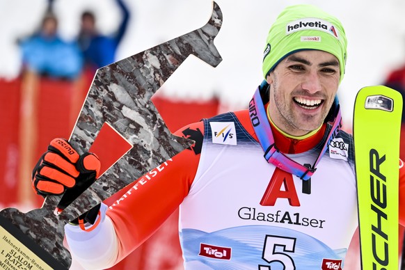 epa10422985 Winner Daniel Yule of Switzerland celebrates during the podium ceremony of the men&#039;s slalom race at the FIS Alpine Skiing World Cup in Kitzbuehel, Austria, 22 January 2023. EPA/JEAN-C ...