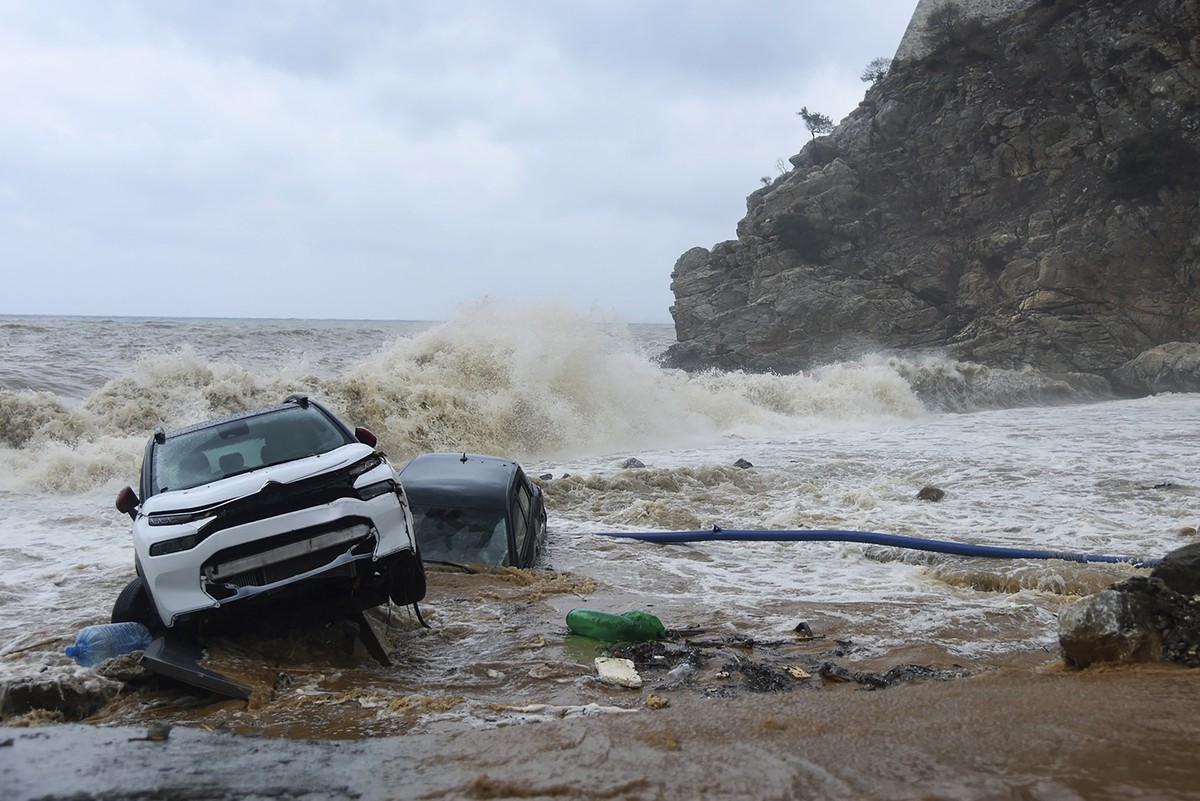 Cars abandoned by the sea following heavy thunderstorms, in the village of Paliokastro, on the island of Crete, Greece, Saturday, Oct. 15, 2022. It has been reported that at least one person has died  ...