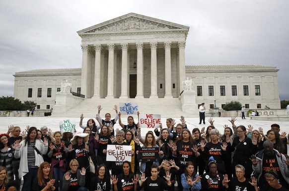 Protesters gather in front of the Supreme Court on Capitol Hill in Washington, Thursday, Sept. 27, 2018. The Senate Judiciary Committee is scheduled to hear Thursday from Supreme Court nominee Brett K ...