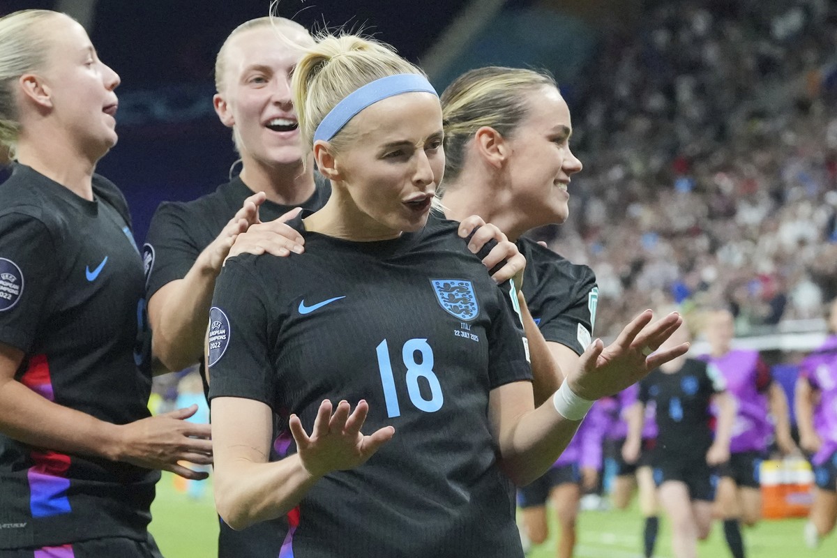 England's Chloe Kelly is celebrated after she scored the decisive second goal for England during the Women's Euro 2025 semifinals soccer match between England and Italy at Stade de Geneve in ...