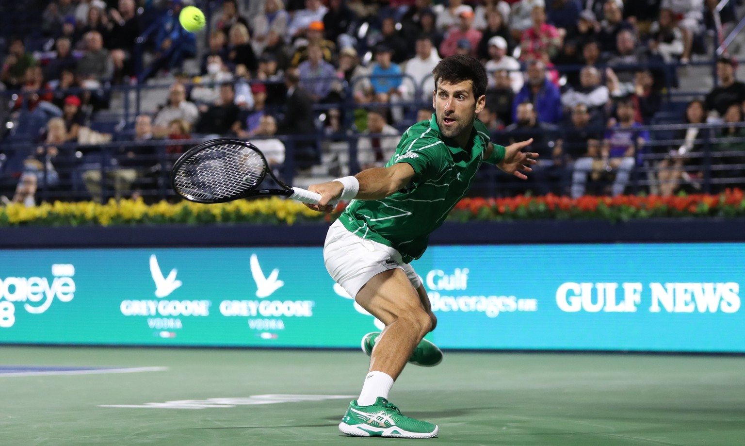 epa08252917 Novak Djokovic of Serbia in action during his quarter final match against Karen Khachanov of Russia at the Dubai Duty Free Tennis ATP Championships 2020 in Dubai, United Arab Emirates, 27  ...