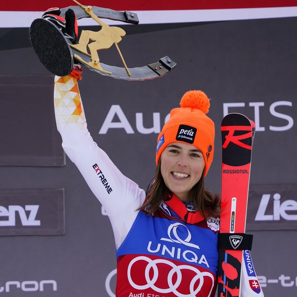 Slovakia&#039;s Petra Vlhova celebrates on the podium after winning an alpine ski women&#039;s World Cup slalom race, in Lienz, Austria, Wednesday, Dec. 29, 2021. (AP Photo/Marco Tacca)
