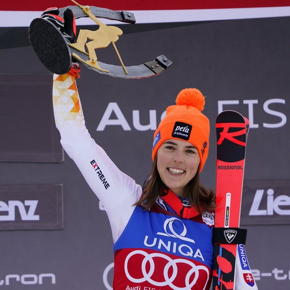 Slovakia&#039;s Petra Vlhova celebrates on the podium after winning an alpine ski women&#039;s World Cup slalom race, in Lienz, Austria, Wednesday, Dec. 29, 2021. (AP Photo/Marco Tacca)