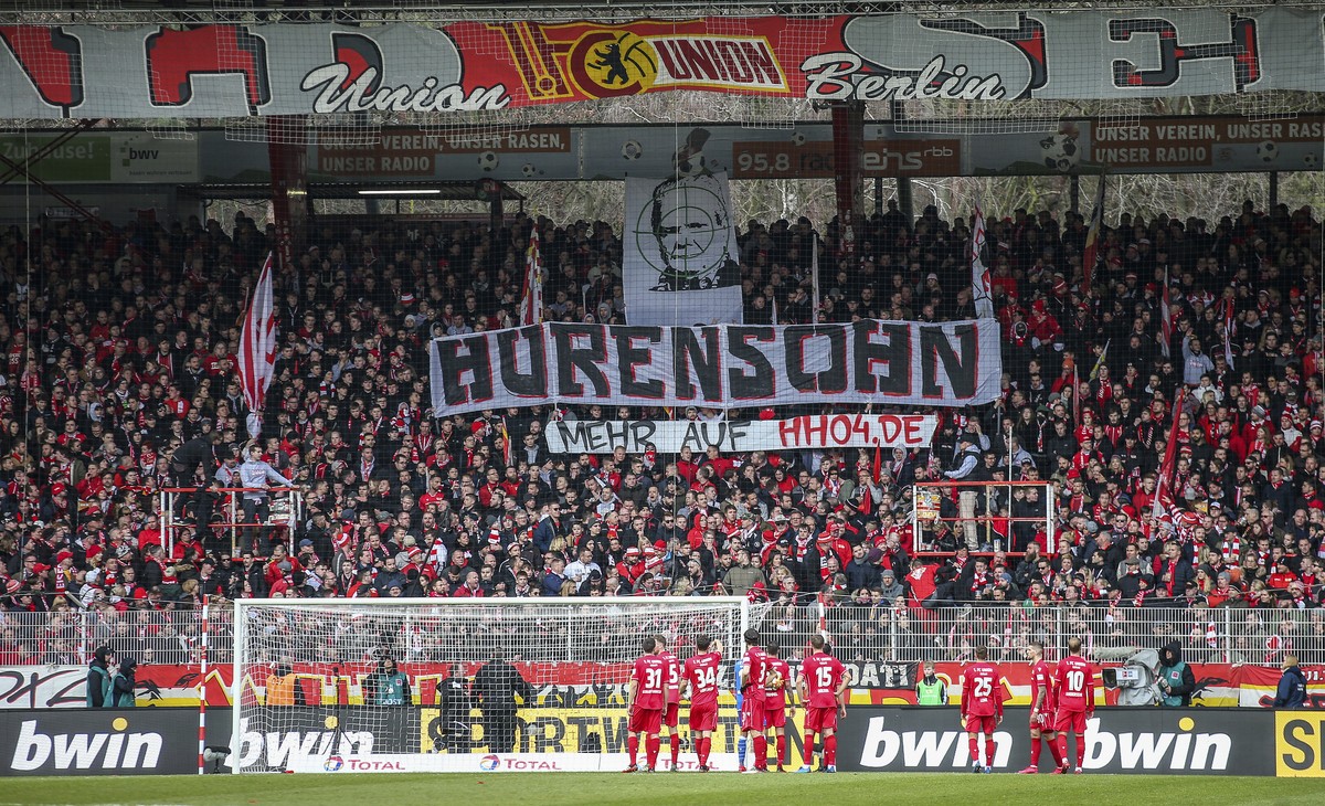 Union fans on the tribune display a banner reading "Son of a bitch" against TSG Hoffenheim club patron Dietmar Hopp during the German Bundesliga soccer match between 1. FC Union Berlin and V ...
