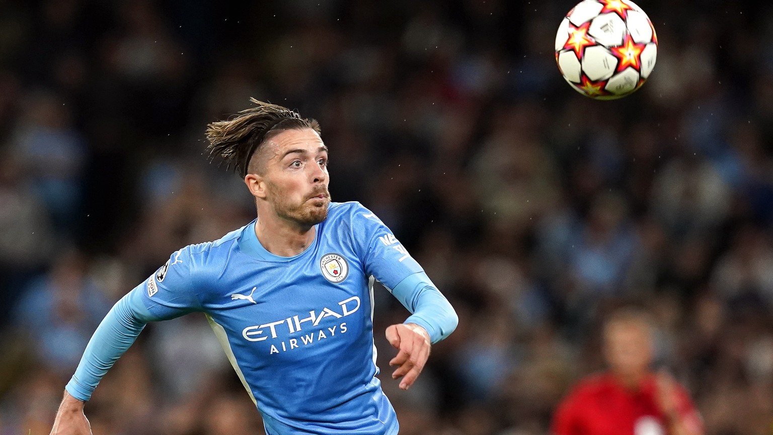epa09470696 Manchester City's Jack Grealish in action during the UEFA Champions League group A soccer match between Manchester City and RB Leipzig in Manchester, Britain, 15 September 2021. EPA/Andrew ...