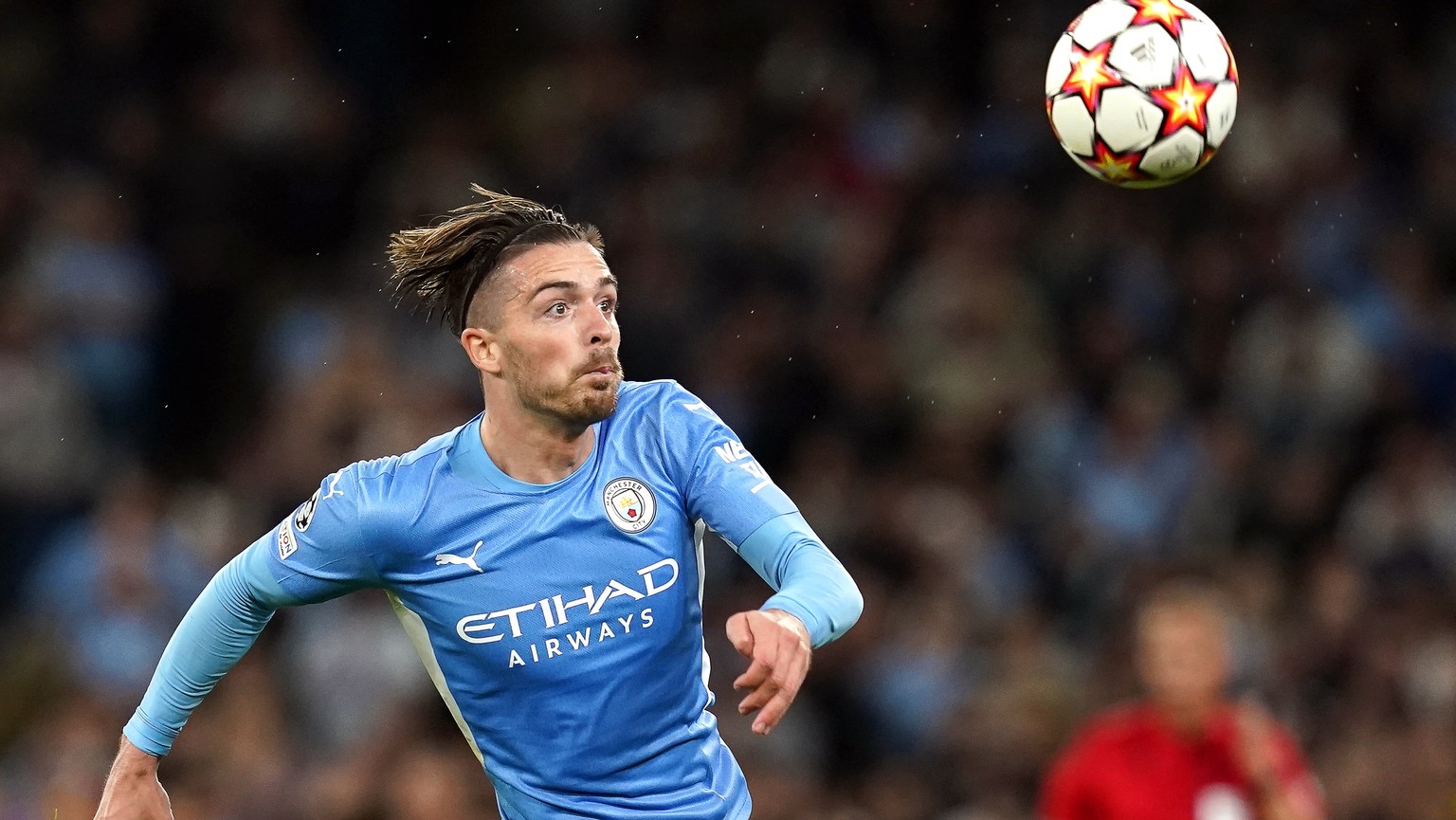 epa09470696 Manchester City&#039;s Jack Grealish in action during the UEFA Champions League group A soccer match between Manchester City and RB Leipzig in Manchester, Britain, 15 September 2021. EPA/A ...