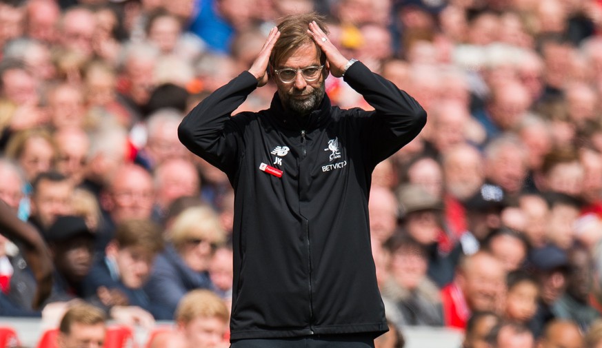 epa06698716 Liverpool’s manager Juergen Klopp reacts during the English Premier League soccer match between Liverpool FC and Stoke City FC held at the Anfield, Liverpool, Britain, 28 April 2018. EPA/P ...
