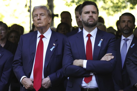 FILE - Republican presidential nominee former President Donald Trump and Republican vice presidential nominee Sen. JD Vance, R-Ohio, attend the 9/11 Memorial ceremony on the 23rd anniversary of the Se ...
