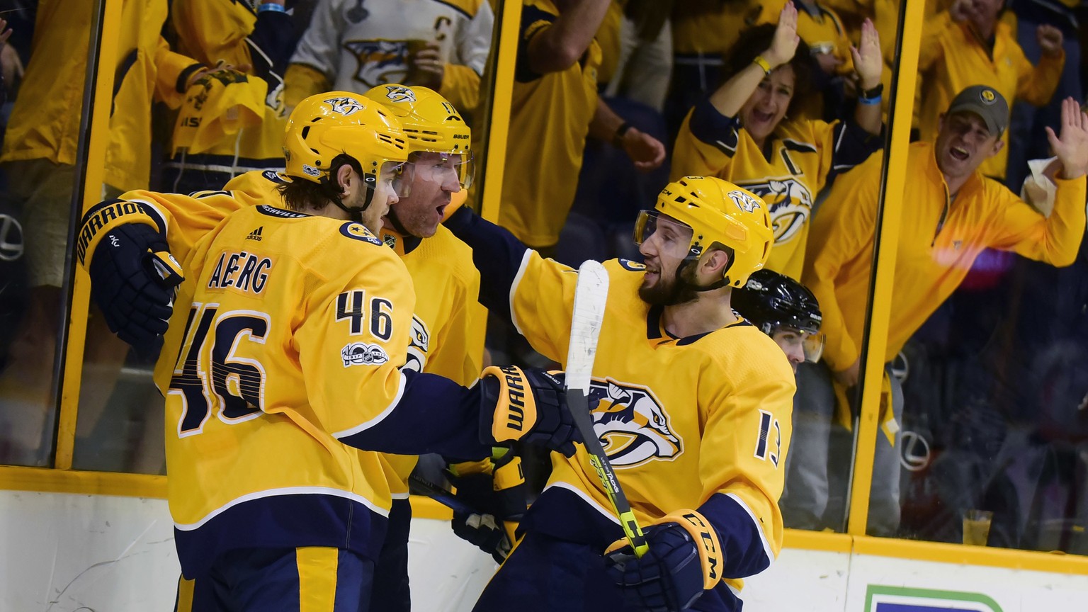 Nashville Predators forward Pontus Aberg (46) forward Scott Hartnell (17) and forward Nick Bonino (13) celebrate a goal by Hartnell against the Philadelphia Flyers in the second period of an NHL hocke ...