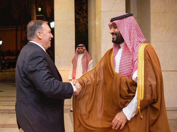 epa07851504 A handout photo made available by the Saudi Royal Court shows Saudi Crown Prince Mohammad bin Salman receiving US Secretary of State Mike Pompeo, Jeddah, Saudi Arabia, 18 September 2019. P ...